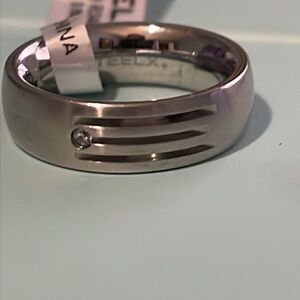 NWT STEELX RINGS IN SIZE 6 with cubic zirconia Chip.